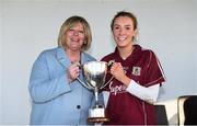 12 November 2017; Megan Glynn of Galway is presented with the Aisling McGing Memorial Cup by LGFA President Marie Hickey following the All Ireland U21 Ladies Football Final match between Mayo and Galway at St. Croans GAA Club in Keelty, Roscommon. Photo by Sam Barnes/Sportsfile
