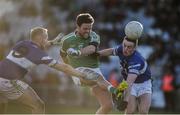 12 November 2017; Cian O'Connor of Moorefield in action against Ciarán McEvoy, left, and Brendan Carroll of Portlaoise during the AIB Leinster GAA Football Senior Club Championship Quarter-Final match between Portlaoise and Moorefield at O'Moore Park in Portlaoise, Laois. Photo by Daire Brennan/Sportsfile