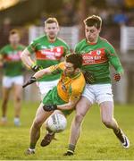 12 November 2017; Ian Burke of Corofin is tackled by Niall McInerney of St Brigid's during the AIB Connacht GAA Football Senior Club Championship Semi-Final match between Corofin and St Brigid's at Tuam Stadium in Tuam, Galway. Photo by Brendan Moran/Sportsfile