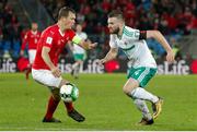 12 November 2017; Stuart Dallas of Northern Ireland in action against Stephan Lichtsteiner of Switzerland during the FIFA 2018 World Cup Qualifier Play-off 2nd leg match between Switzerland and Northern Ireland at St. Jakob's Park in Basel, Switzerland. Photo by Roberto Bregani/Sportsfile