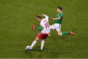 14 November 2017; Christian Eriksen of Denmark has a shot on goal despite a tackle by Stephen Ward of Republic of Ireland during the FIFA 2018 World Cup Qualifier Play-off 2nd leg match between Republic of Ireland and Denmark at Aviva Stadium in Dublin.Photo by Brendan Moran/Sportsfile