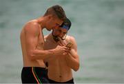 16 November 2017; Killian Clarke and Niall Sludden review photographs, on a mobile phone, during the Ireland International Rules Squad relaxing swim at Cottersloe Beach, Perth, Australia Photo by Ray McManus/Sportsfile