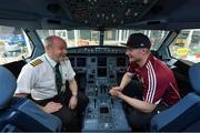 17 November 2017; Galway hurler Joe Canning with Aer Lingus captain Brian Rush in the cockpit as they departed Dublin Airport for Boston onboard Aer Lingus flight EI 137. Aer Lingus, official airline of the AIG Fenway Hurling Classic and Irish Festival, has been serving Boston since 1958 and is thrilled to once again be supporting this unique cultural and sporting event, bringing 130 hurlers to Boston’s iconic Fenway Park. Games will be broadcast on TG4 on November 19th with Dublin v Galway in the first semi-final followed by Clare v Tipperary in the second semi-final. Photo by Brendan Moran/Sportsfile