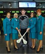 17 November 2017; Galway hurlers departed Dublin Airport for Boston today onboard Aer Lingus flight EI137. Aer Lingus, official airline of the AIG Fenway Hurling Classic and Irish Festival, has been serving Boston since 1958 and is thrilled to once again be supporting this unique cultural and sporting event, bringing 130 hurlers to Boston’s iconic Fenway Park. Games will be broadcast on TG4 on November 19th with Dublin v Galway in the first semi-final followed by Clare v Tipperary in the second semi-final. Pictured is Galway hurler Joe Canning with Aer Lingus cabin crew, from left, Monica Bermejo, Doreen Crotty, Jackie Bailey and Olive Bohan. Photo by Ramsey Cardy/Sportsfile