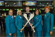 17 November 2017; Galway hurlers departed Dublin Airport for Boston today onboard Aer Lingus flight EI137. Aer Lingus, official airline of the AIG Fenway Hurling Classic and Irish Festival, has been serving Boston since 1958 and is thrilled to once again be supporting this unique cultural and sporting event, bringing 130 hurlers to Boston’s iconic Fenway Park. Games will be broadcast on TG4 on November 19th with Dublin v Galway in the first semi-final followed by Clare v Tipperary in the second semi-final. Pictured is Galway hurler Joe Canning with Aer Lingus cabin crew, from left, Monica Bermejo, Doreen Crotty, Jackie Bailey and Olive Bohan. Photo by Ramsey Cardy/Sportsfile