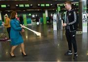 17 November 2017; Galway hurlers departed Dublin Airport for Boston today onboard Aer Lingus flight EI137. Aer Lingus, official airline of the AIG Fenway Hurling Classic and Irish Festival, has been serving Boston since 1958 and is thrilled to once again be supporting this unique cultural and sporting event, bringing 130 hurlers to Boston’s iconic Fenway Park. Games will be broadcast on TG4 on November 19th with Dublin v Galway in the first semi-final followed by Clare v Tipperary in the second semi-final. Pictured is Aer Lingus cabin crew member Jackie Bailey with Galway's Joe Canning. Photo by Ramsey Cardy/Sportsfile