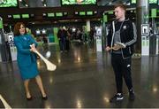 17 November 2017; Galway hurlers departed Dublin Airport for Boston today onboard Aer Lingus flight EI137. Aer Lingus, official airline of the AIG Fenway Hurling Classic and Irish Festival, has been serving Boston since 1958 and is thrilled to once again be supporting this unique cultural and sporting event, bringing 130 hurlers to Boston’s iconic Fenway Park. Games will be broadcast on TG4 on November 19th with Dublin v Galway in the first semi-final followed by Clare v Tipperary in the second semi-final. Pictured is Aer Lingus cabin crew member Jackie Bailey with Galway's Joe Canning. Photo by Ramsey Cardy/Sportsfile