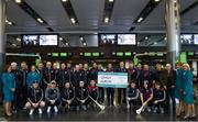 17 November 2017; Galway hurlers departed Dublin Airport for Boston today onboard Aer Lingus flight EI137. Aer Lingus, official airline of the AIG Fenway Hurling Classic and Irish Festival, has been serving Boston since 1958 and is thrilled to once again be supporting this unique cultural and sporting event, bringing 130 hurlers to Boston’s iconic Fenway Park. Games will be broadcast on TG4 on November 19th with Dublin v Galway in the first semi-final followed by Clare v Tipperary in the second semi-final. Pictured is the Galway team with Aer Lingus cabin crew members. Photo by Ramsey Cardy/Sportsfile