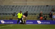 18 November 2017; A man who ran on to the pitch after the game is pursued by security personnel after the Virgin Australia International Rules Series 2nd test at the Domain Stadium in Perth, Australia. Photo by Ray McManus/Sportsfile