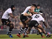 18 November 2017; Chris Farrell of Ireland is tackled by Ben Volavola, left, and Levani Botia of Fiji during the Guinness Series International match between Ireland and Fiji at the Aviva Stadium in Dublin. Photo by Seb Daly/Sportsfile