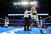 18 November 2017; David Oliver Joyce after knocking down Reynaldo Cajina during their super featherweight bout at the SSE Arena in Belfast. Photo by Ramsey Cardy/Sportsfile