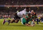 18 November 2017; Dave Kearney of Ireland scores his side's second try despite the tackle of Timoci Nagusa of Fiji during the Guinness Series International match between Ireland and Fiji at the Aviva Stadium in Dublin. Photo by Seb Daly/Sportsfile