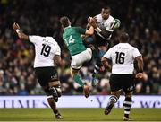 18 November 2017; Kini Murimurivalu of Fiji in action against Darren Sweetnam of Ireland during the Guinness Series International match between Ireland and Fiji at the Aviva Stadium in Dublin. Photo by Seb Daly/Sportsfile