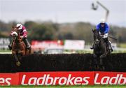 19 November 2017; Woodland Opera, with Robbie Power up, right, leads Tombstone, with Davy Russell up, over the last on their way to winning the novice steeplechase at Punchestown Racecourse in Naas, Co Kildare. Photo by Ramsey Cardy/Sportsfile