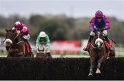 19 November 2017; Jury Duty, with Robbie Power up, leads Shattered Love, with Sean Flanagan up, over the last on their way to winning the novice steeplchase at Punchestown Racecourse in Naas, Co Kildare. Photo by Ramsey Cardy/Sportsfile