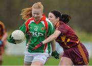 19 November 2017; Aoife Brennan of Carnacon in action against Lynda Donnelly of St Macartan's during the All-Ireland Ladies Football Senior Club Championship Semi-Final match between St Macartan's and Carnacon at Fr. Hackett Park in Augher, Tyrone. Photo by Oliver McVeigh/Sportsfile