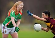 19 November 2017; Aoife Brennan of Carnacon in action against Maura McMenamin of St Macartan's during the All-Ireland Ladies Football Senior Club Championship Semi-Final match between St Macartan's and Carnacon at Fr. Hackett Park in Augher, Tyrone. Photo by Oliver McVeigh/Sportsfile
