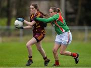 19 November 2017; Chloe McCaffrey of St Macartan's in action against Sharon McGing of Carnacon during the All-Ireland Ladies Football Senior Club Championship Semi-Final match between St Macartan's and Carnacon at Fr. Hackett Park in Augher, Tyrone. Photo by Oliver McVeigh/Sportsfile