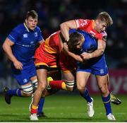 24 November 2017; Jordan Larmour of Leinster is tackled by Aaron Wainwright and Adam Warren of Dragons during the Guinness PRO14 Round 9 match between Leinster and Dragons at the RDS Arena in Dublin. Photo by Ramsey Cardy/Sportsfile