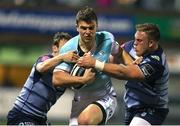 24 November 2017; Tom Farrell of Connacht is tackled by Jarrod Evans and Corey Domachowski of Cardiff Blues during the Guinness PRO14 Round 9 match between Cardiff Blues and Connacht at Arms Park in Cardiff, Wales. Photo by Gareth Everett/Sportsfile