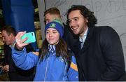 24 November 2017; Leinster's James Lowe with a supporter in Autograph Alley ahead of the Guinness PRO14 Round 9 match between Leinster and Dragons at the RDS Arena in Dublin. Photo by Ramsey Cardy/Sportsfile