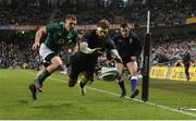 25 November 2017; Ramiro Moyano of Argentina scores his side's third try despite the efforts of Andrew Conway of Ireland during the Guinness Series International match between Ireland and Argentina at the Aviva Stadium in Dublin. Photo by Piaras Ó Mídheach/Sportsfile