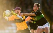 26 November 2017; Fionn Fitzgerald of Dr. Crokes in action against Paul Kerrigan of Nemo Rangers during the AIB Munster GAA Football Senior Club Championship Final match between Dr. Crokes and Nemo Rangers at Páirc Ui Rinn in Cork. Photo by Eóin Noonan/Sportsfile