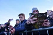 26 November 2017; A general view spectator reading the programme during the Irish Life Health Juvenile Even Age Cross Country Championships 2017 at the National Sports Campus in Abbotstown, Dublin. Photo by David Fitzgerald/Sportsfile
