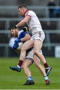 26 November 2017; Michael Lyng of Cavan is tackled by Patsy Bradley of Slaughtneil Gaels during the AIB Ulster GAA Football Senior Club Championship Final match between Slaughtneil and Cavan Gaels at the Athletic Grounds in Armagh. Photo by Oliver McVeigh/Sportsfile