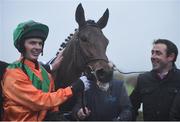 26 November 2017; Jockey Eoin O'Brien and trainer Ray Hackett with Crackerdancer in the parade ring after winning the Coolmore N.H. Sires Irish EBF Mares Flat Race at Navan Racecourse in Navan, Co Meath. Photo by Cody Glenn/Sportsfile