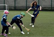 27 November 2017; Mags D'Arcy of Wexford, right, with Sarah Ryan, left, and Sean Fitzgerald, both of Killinure N.S., Limerick, during the launch of the GAA 5 Star Centres at O'Connell Boys National School and Croke Park in Dublin. Photo by Sam Barnes/Sportsfile