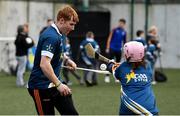 27 November 2017; Conor Whelan of Galway and Lily Mai Berry of Scoil Réalt Na Mara, Kilmore, Co. Wexford, during the launch of the GAA 5 Star Centres at O'Connell Boys National School and Croke Park in Dublin. Photo by Sam Barnes/Sportsfile