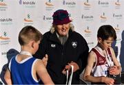 26 November 2017; Georgina Drumm, President of Athletics Ireland, hands out medals after the U12 Boys race during the Irish Life Health Juvenile Even Age Cross Country Championships 2017 at the National Sports Campus in Abbotstown, Dublin. Photo by David Fitzgerald/Sportsfile