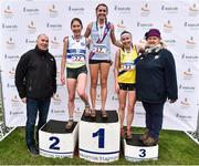 26 November 2017; Silver medalist Lauren Dermody of Kilkenny AC, left, gold medalist Bethanie Murray of Dundrum South Dublin A.C.,centre, and Katie Moore of North Down A.C., with Jim Dowdall, Managing Director of Irish Life health, left, and Georgina Drumm, President of Athletics Ireland following the Women's U23 Race during the Irish Life Health Juvenile Even Age Cross Country Championships 2017 at the National Sports Campus in Abbotstown, Dublin. Photo by David Fitzgerald/Sportsfile