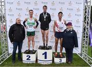26 November 2017; Silver medalist Kevin Dooney of Raheny Shamrock A.C., left, gold medalist Paul Pollock of the Annadale Striders, centre, and bronze medalist Hugh Armstrong of Ballina A.C. with Jim Dowdall of Irish Life health, left, and Georgina Drumm, President of Athletics Ireland, during the Irish Life Health Juvenile Even Age Cross Country Championships 2017 at the National Sports Campus in Abbotstown, Dublin. Photo by David Fitzgerald/Sportsfile