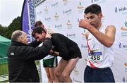26 November 2017; Senior Men's race winner Paul Pollock of the Annadale Striders is presented his gold medal from Jim Dowdall of Irish Life health during the Irish Life Health Juvenile Even Age Cross Country Championships 2017 at the National Sports Campus in Abbotstown, Dublin. Photo by David Fitzgerald/Sportsfile
