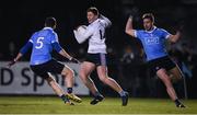 30 November 2017; Evan O'Connor of UCD in action against Colin Doyle, left, and Sean McMahon of Dublin during the Official Opening of Billings Park match between UCD and Dublin at Billings Park in UCD, Dublin. Photo by Cody Glenn/Sportsfile