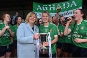 2 December 2017; Emma Farmer captain of Aghada is presented with the cup by LGFA President Marie Hickey after the All-Ireland Ladies Football Junior Club Championship Final match between Aghada and Corduff at Crettyard in Co Laois. Photo by Matt Browne/Sportsfile