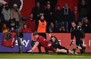 2 December 2017; Chris Cloete of Munster scores his side's third try despite the efforts of Jeff Hassler of Ospreys during the Guinness PRO14 Round 10 match between Munster and Ospreys at Irish Independent Park in Cork. Photo by Diarmuid Greene/Sportsfile