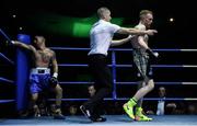 2 December 2017; Niall O'Connor, right, is ushered back to his corner after knocking down Manuel Prieto during their bout at the National Stadium in Dublin. Photo by David Fitzgerald/Sportsfile