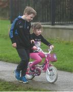 3 December 2017; Ciarán Lenihan, age 9, and sister Aoife, age 4, from Swords, Co Dublin, finish run. parkrun Ireland in partnership with Vhi, expanded their range of junior events to thirteen with the introduction of the Holywell junior parkrun on Sunday, December 3rd. Junior parkruns are 2km long and cater for 4 to 14 year olds, free of charge providing a fun and safe environment for children to enjoy exercise. To register for a parkrun near you visit www.parkrun.ie. Photo by Cody Glenn/Sportsfile