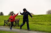 3 December 2017; Sam O'Donohue, from Stillorgan, Dublin, is encouraged by his father Donal while taking part in the parkrun Ireland event in Deerpark, Mount Merrion, Dublin. parkrun Ireland in partnership with Vhi, expanded their range of junior events to thirteen with the introduction of the Deerpark junior parkrun on Sunday, December 3rd. Junior parkruns are 2km long and cater for 4 to 14 year olds, free of charge providing a fun and safe environment for children to enjoy exercise. To register for a parkrun near you visit www.parkrun.ie. Photo by Brendan Moran/Sportsfile