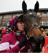 3 December 2017; Jockey Jack Kennedy kisses Apple's Jade in the winner's enclosure after Bar One Racing Hatton´s Grace Hurdle at Fairyhouse Racecourse in Fairyhouse, Co Meath. Photo by Cody Glenn/Sportsfile
