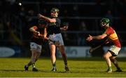 3 December 2017; Conor Hynes of Liam Mellows passes off under pressure from Kaelen Higgins, left, and Sylvie Óg Linnane of Gort during the Galway County Senior Hurling Championship Final match between Gort and Liam Mellows at Pearse Stadium in Galway. Photo by Piaras Ó Mídheach/Sportsfile