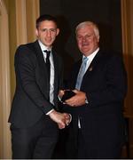 2 December 2017; Uachtarán Chumann Lúthchleas Gael Aogán Ó Fearghail presents Eoghan O'Gara with his medal during the Dublin All-Ireland medal presentations at the InterContinental Dublin in Ballsbridge, Dublin. Photo by Ray McManus/Sportsfile