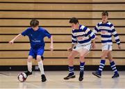 05 December 2017; Leo Byrne of St Joseph's College, Co. Galway, in action against John Jordan of Good Counsel College, New Ross, Co. Wexford, during the FAI Post Primary Schools Futsal Finals at Waterford IT Indoor Arena in Waterford. Photo by Seb Daly/Sportsfile