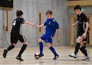 05 December 2017; Adam Duffy of Carndonagh Community School, Co. Donegal, in action against Miceal O'Mahony, left, and Harry Nevin of St. Francis College, Rochestown, Co. Cork, during the FAI Post Primary Schools Futsal Finals at Waterford IT Indoor Arena in Waterford.  Photo by Seb Daly/Sportsfile