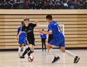 05 December 2017; Harry Flanagan of St. Francis College, Rochestown, Co. Cork, in action against Ekene Unorka of St. Joseph's College, Co. Galway, during the FAI Post Primary Schools Futsal Finals at Waterford IT Indoor Arena in Waterford.  Photo by Seb Daly/Sportsfile