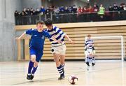 05 December 2017; Darby Purcell of Good Counsel College, New Ross, Co. Wexford, in action against Jamie McKinney of Carndonagh Community School, Co. Donegal, during the FAI Post Primary Schools Futsal Finals at Waterford IT Indoor Arena in Waterford.  Photo by Seb Daly/Sportsfile