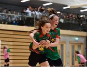 05 December 2017; Katie Collins Byrne, left, of St. Leo's College, Co. Carlow, celebrates with teammate Emma Walker, after scoring her side's third goal against Presentation Secondary School, Ballyphehane, Co. Cork, during the FAI Post Primary Schools Futsal Finals at Waterford IT Indoor Arena in Waterford.  Photo by Seb Daly/Sportsfile